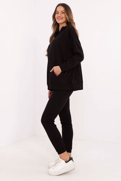 Detail shot of the luxury women's tracksuit set from Factory Price, displaying the soft cotton blend fabric and chic design.