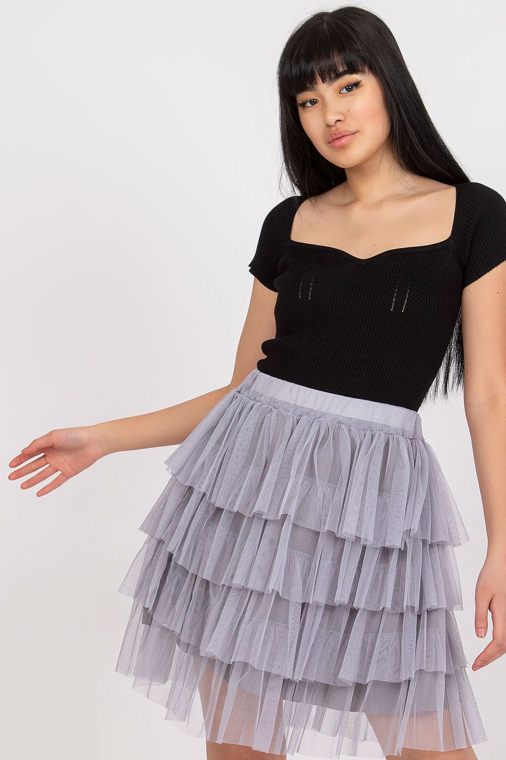 Back view of the elegant mini tulle skirt by Och Bella, demonstrating its high-quality polyester and viscose blend fabric.