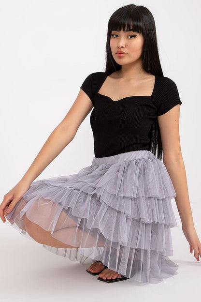 Close-up of the delicate frills on the tulle skirt by Och Bella, highlighting the luxurious texture and comfort fit.