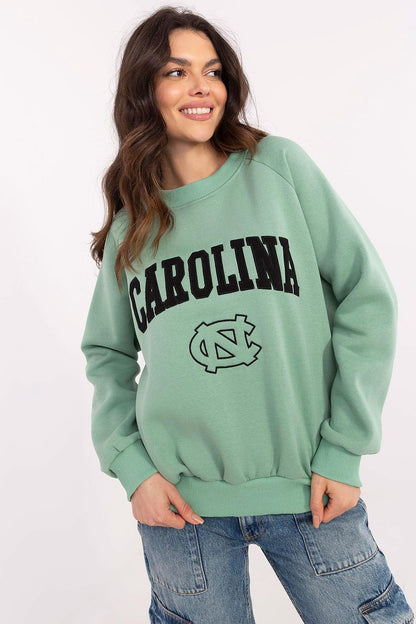 Model showcasing the Luxury Women's Casual Sweatshirt by Factory Price styled with jeans.