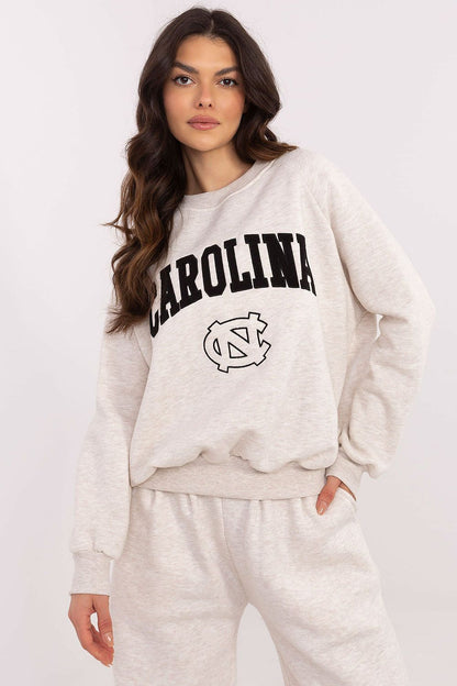 Front view of elegant women's casual sweatshirt by Factory Price with unique embroidery and large inscription for a chic touch.