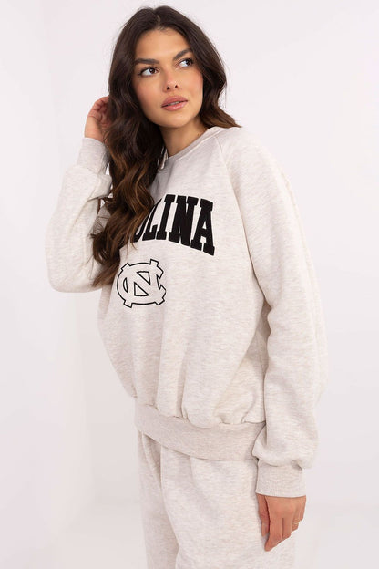 Side view of luxury women's sweatshirt from Factory Price showcasing long sleeves and fashionable fit suitable for various outfits.