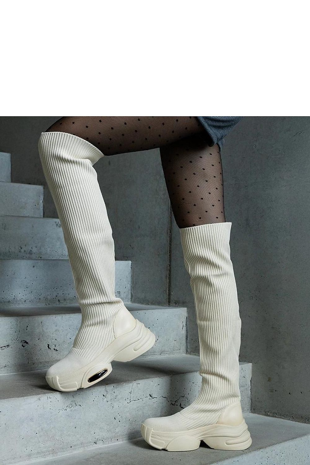 Solea beige thigh-high boots featuring a luxurious elastic collar, perfect for autumn and winter with an 8 cm heel, elegantly displayed.