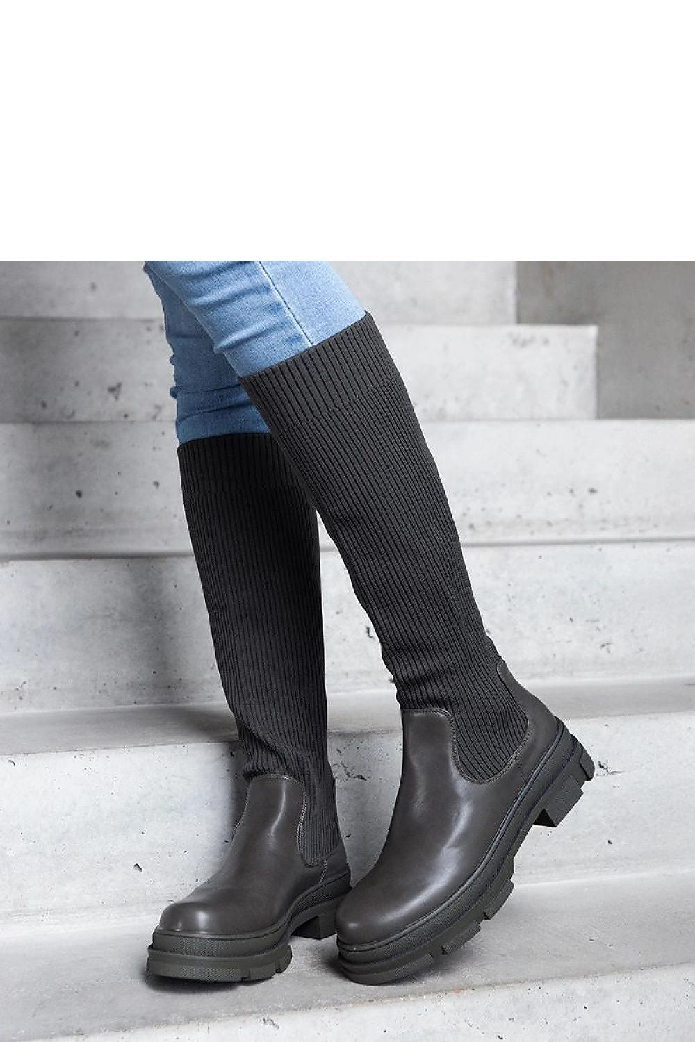 Solea women's Elthea thigh-high boots, showcasing an almond toe and durable rubber construction for stylish comfort.