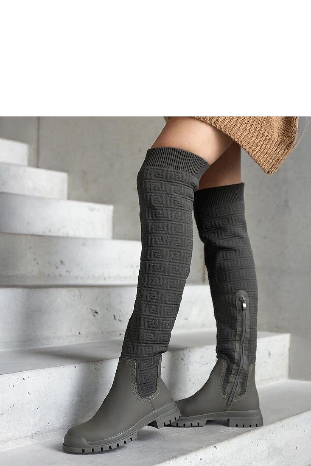 Solea thigh-high boots in green, paired with autumn outfit for a chic winter look.