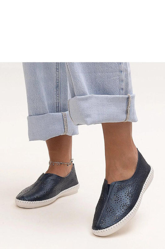 Elegant navy blue Bernice loafers by Solea, crafted from luxurious natural leather, showcasing a stylish rounded toe design with a comfortable slip-on style, perfect for fashion-forward individuals.