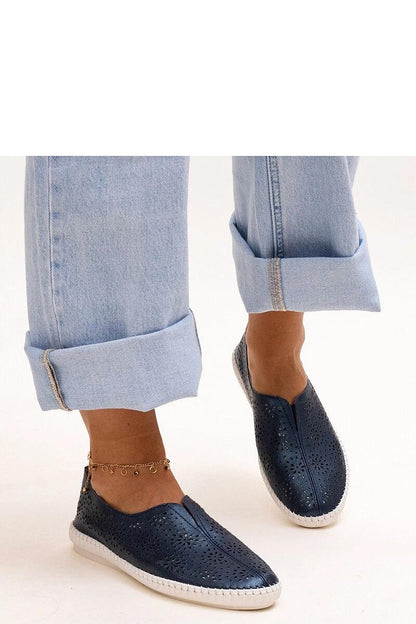 Close-up view of Solea's navy blue Bernice loafers, highlighting the quality natural leather and durable rubber sole, designed for ultimate style and comfort in modern footwear.