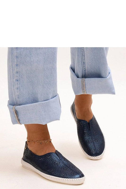 Close-up view of Solea's navy blue Bernice loafers, highlighting the quality natural leather and durable rubber sole, designed for ultimate style and comfort in modern footwear.