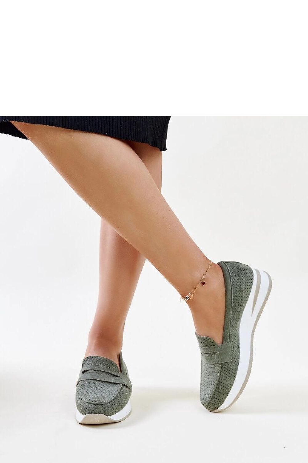 Solea pink loafers featured on a vibrant summer setting, emphasising their elegance and versatility as a slip-on shoe.