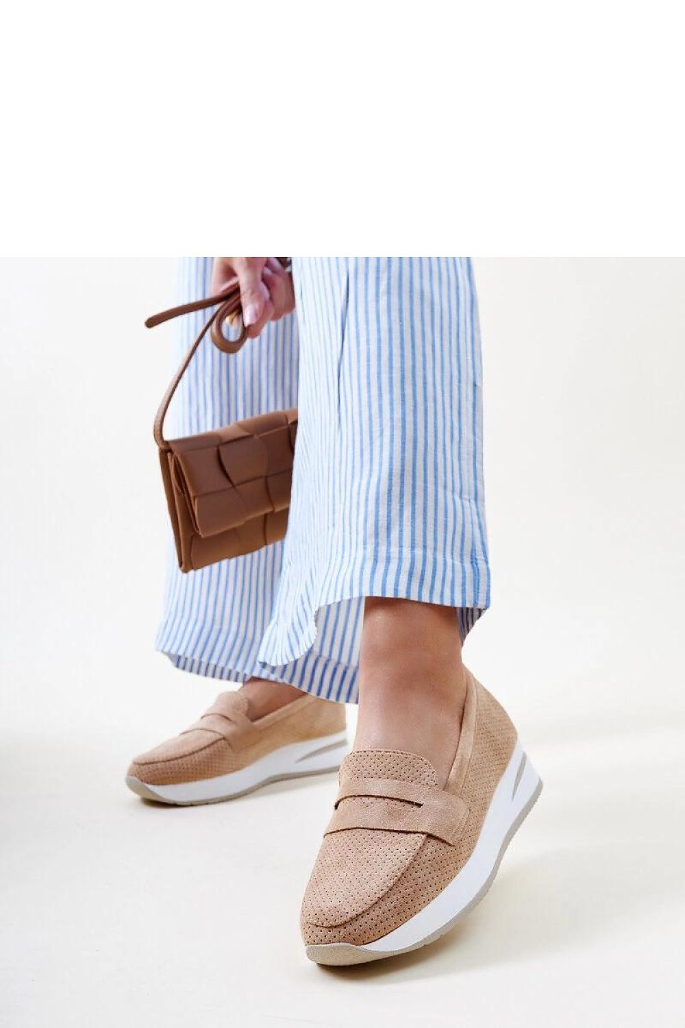 Solea Pink Muna loafers displayed on a stylish surface, epitomising luxurious summer footwear for women in EU sizes 36 to 41.