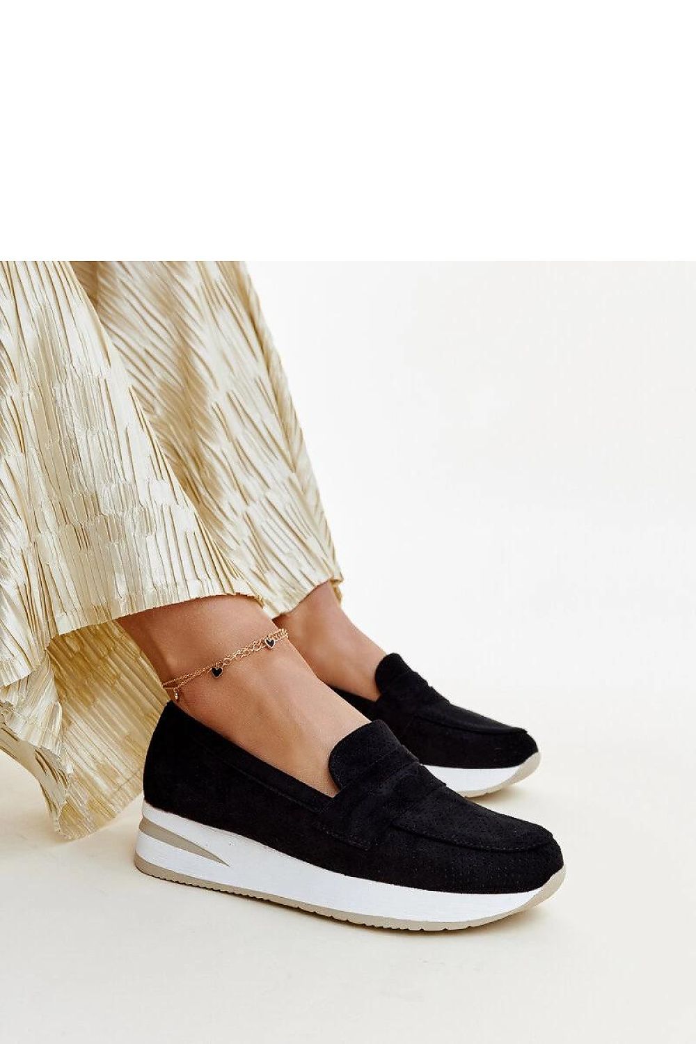 Elegant Solea Pink Muna loafers presented in a chic setting, accentuating their slip-on construction and eco-friendly material for modern style.