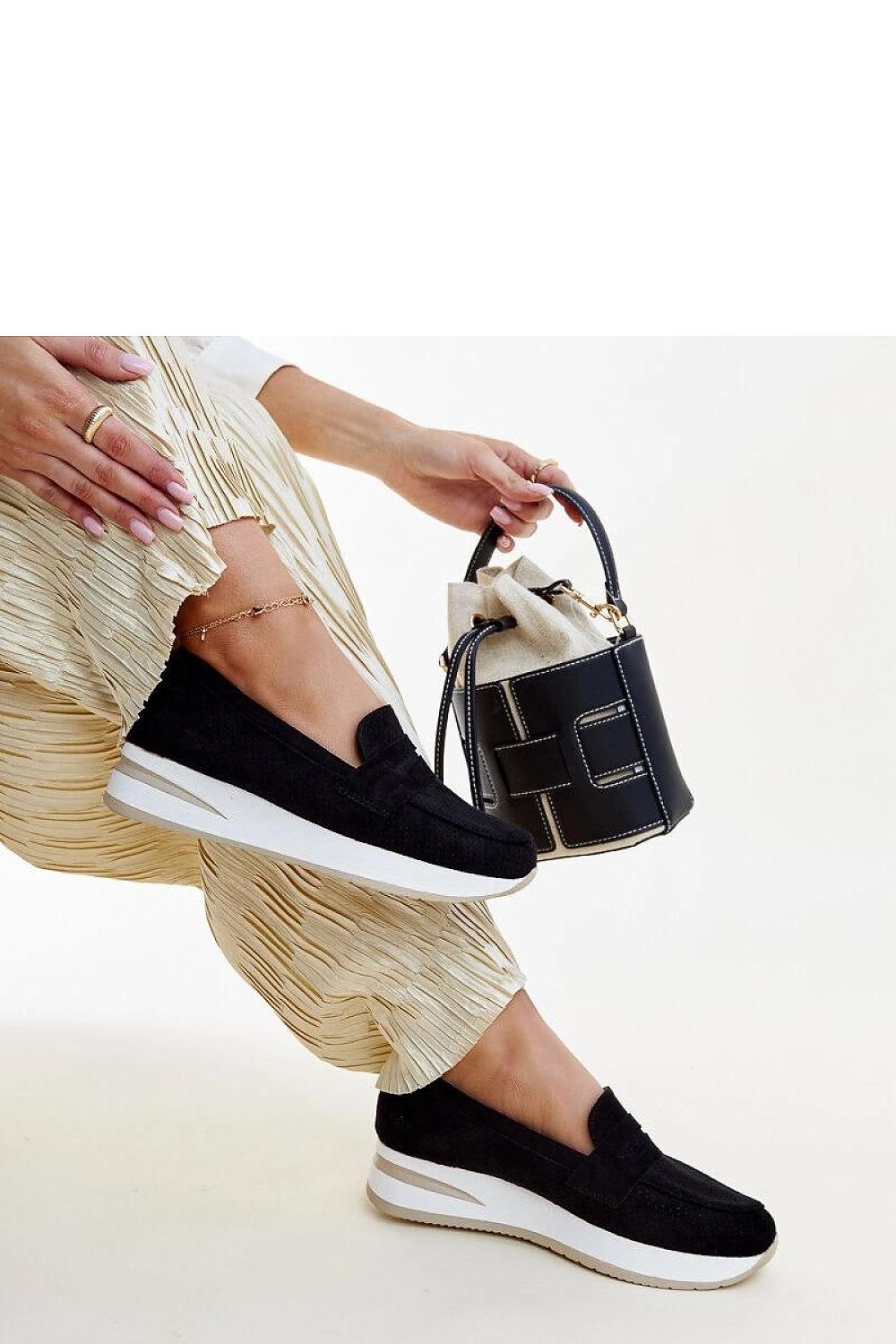 Elegant Solea Pink Muna loafers made from eco leather, showcasing a stylish perforated design for summer wear.