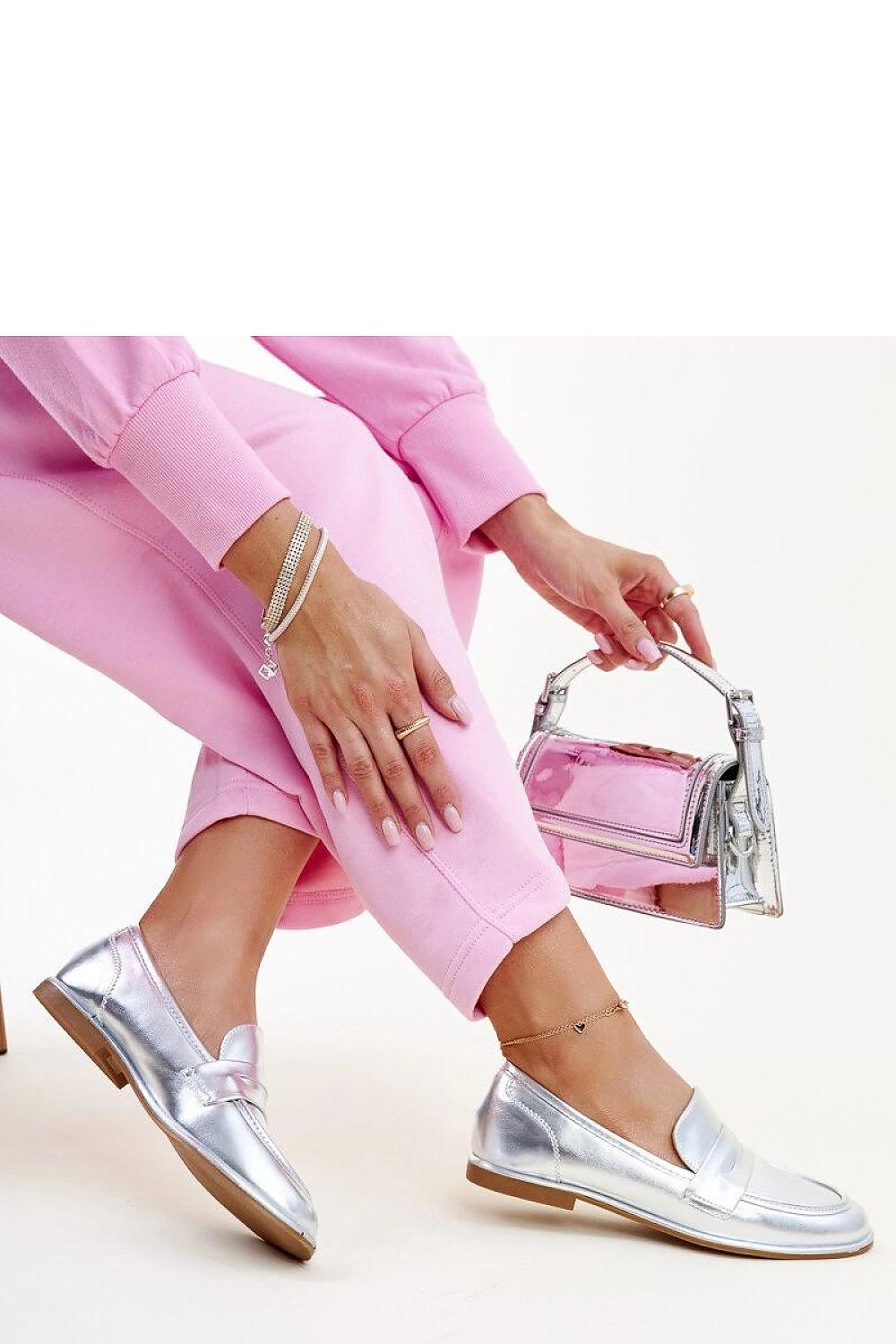 Solea slip-on eco leather moccasins, showcasing a sophisticated metallic finish and lightweight rubber sole, ideal for comfortable everyday wear.