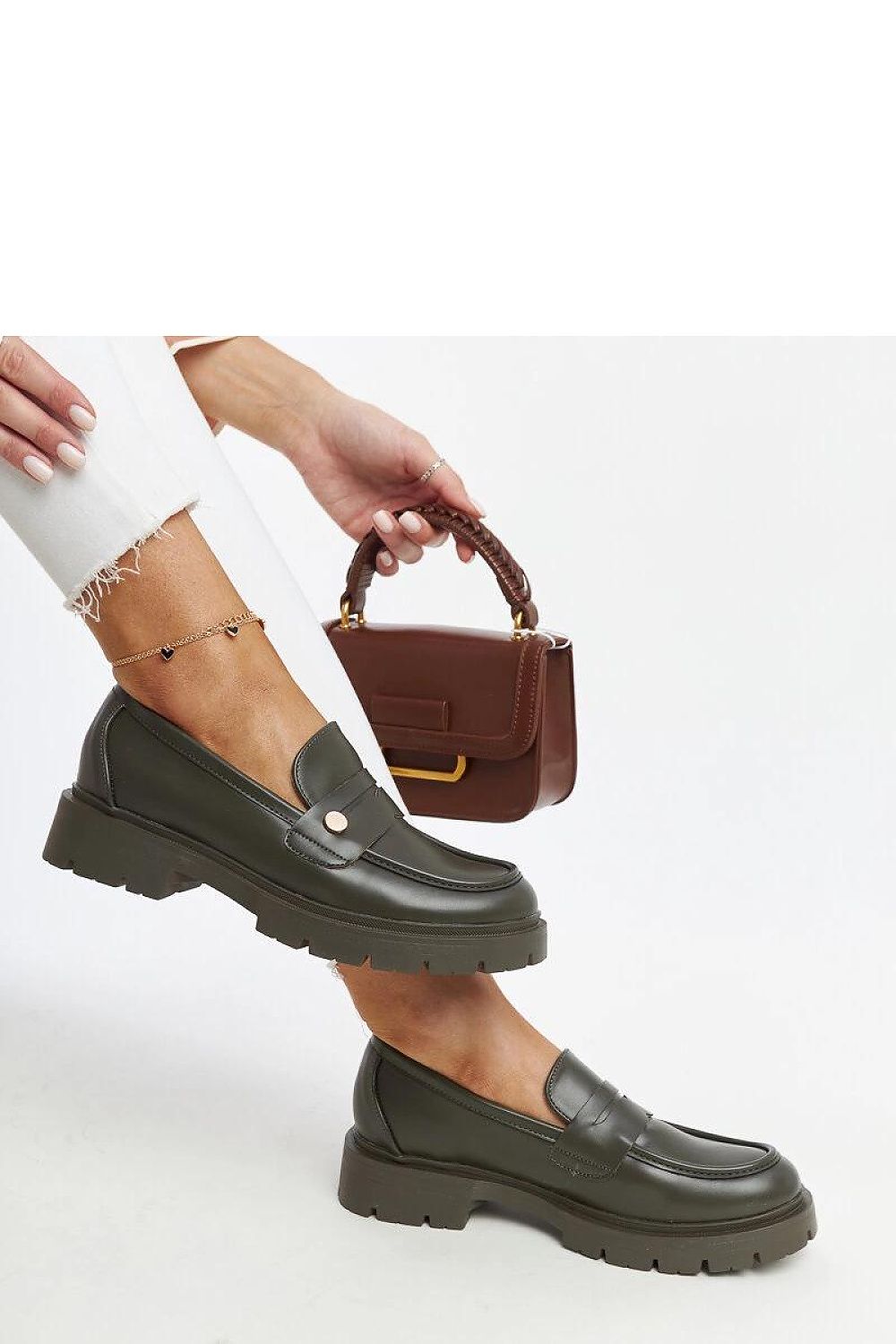 Elegant Solea Dark Green Eko Leather Moccasins displayed with a scenic background, highlighting their premium design and sustainable fabric.