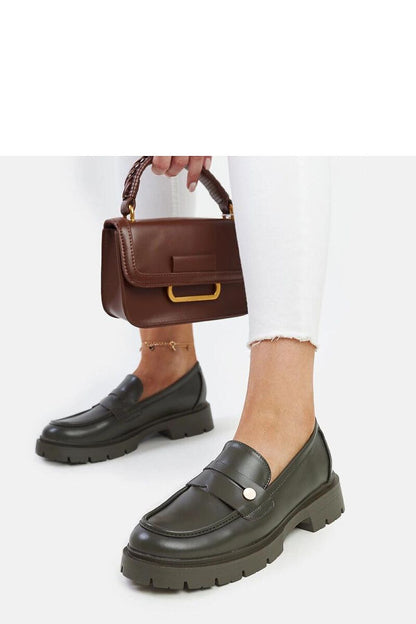 Chic Solea moccasins in dark green Eko leather, highlighting their comfortable and fashionable design suited for casual outings.