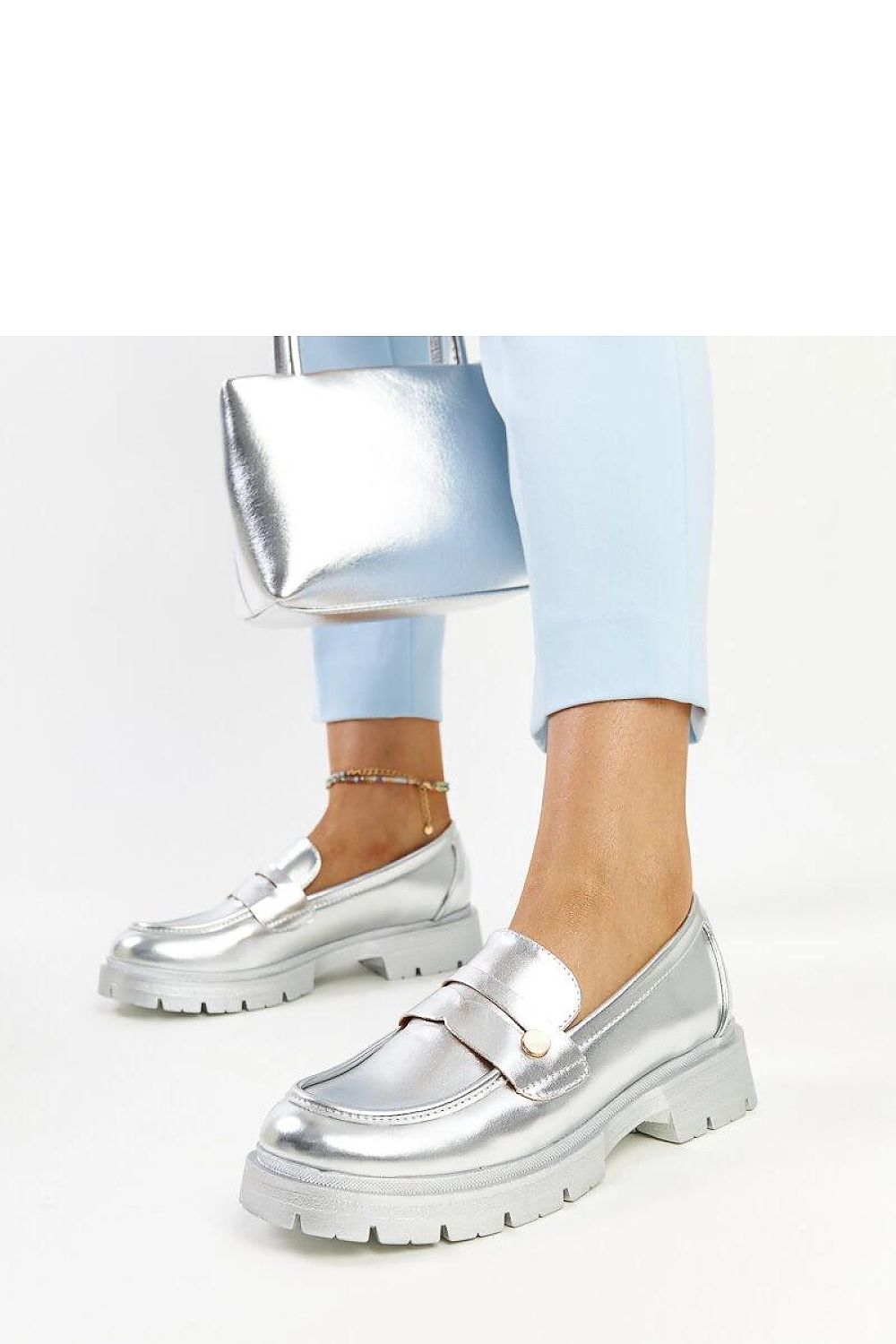 Close-up of Solea chic dark green moccasins, crafted from premium eco leather for a luxurious and stylish look.