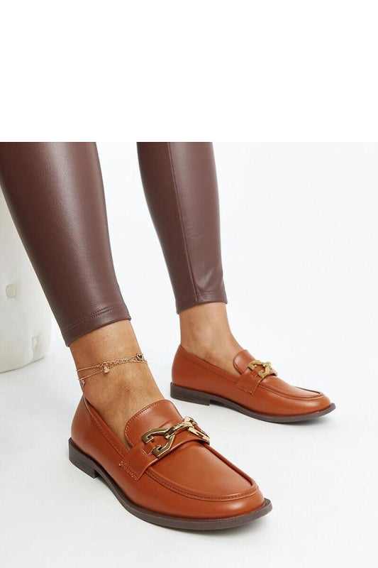Close-up of Solea Brown Lea Moccasins, showcasing the high-quality faux leather finish and comfortable slip-on design.