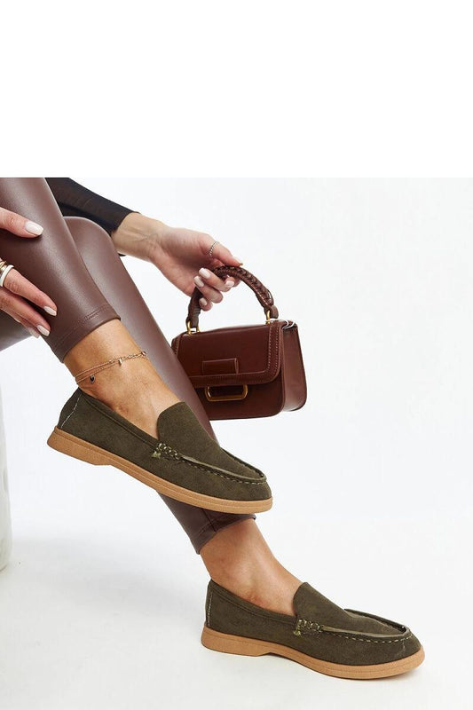 Stylish Solea Dark Green Suede Rumay Loafers elegantly displayed with a rubber sole for ultimate comfort.