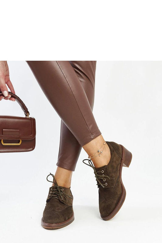 Close-up of Solea Green Suede Heels Tigard, highlighting the luxurious eco leather texture and sophisticated laced closure for comfort and stability.