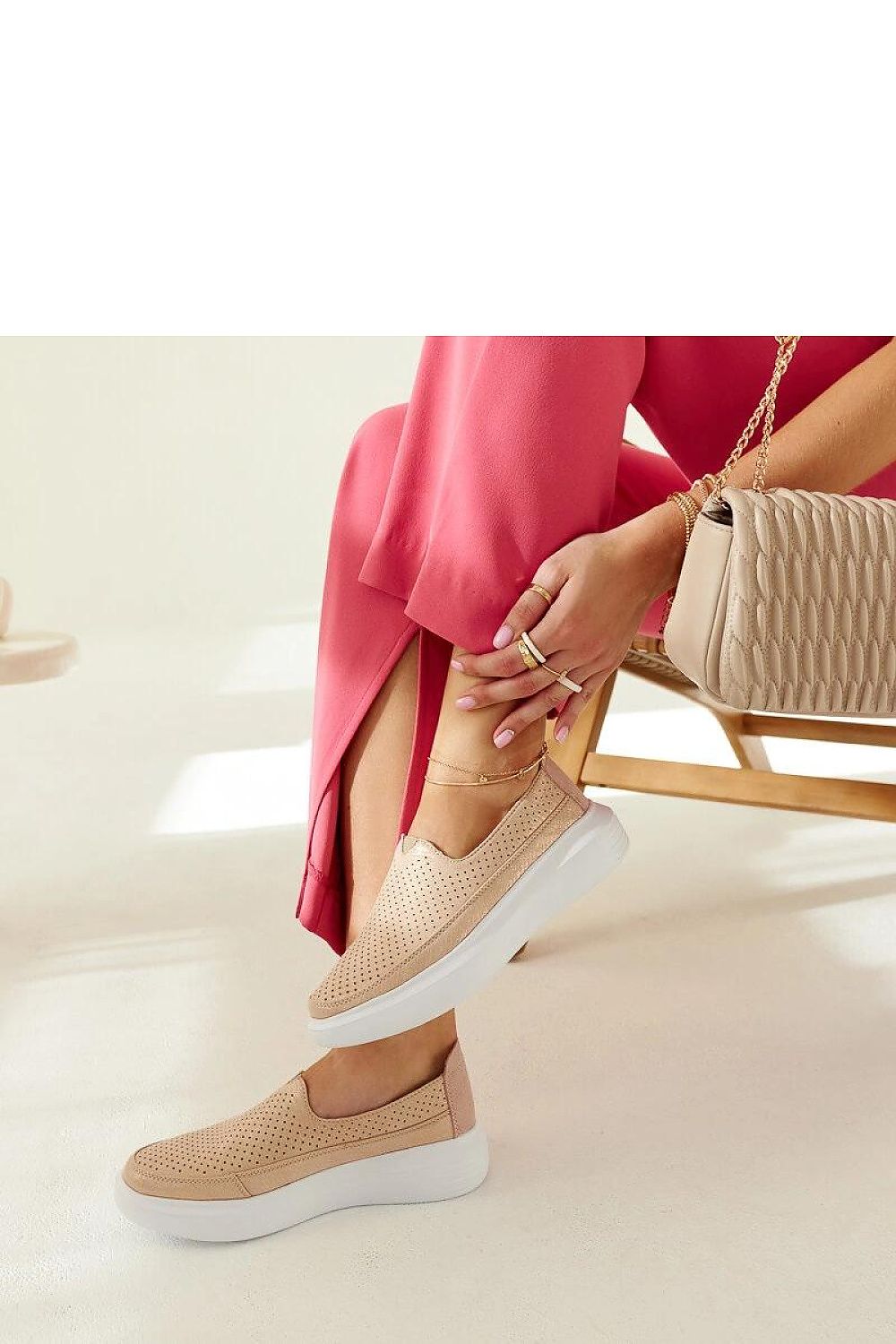 Close-up of Solea Marta slip-on shoes highlighting the round toe and flexible rubber, ideal for both casual and formal outfits.