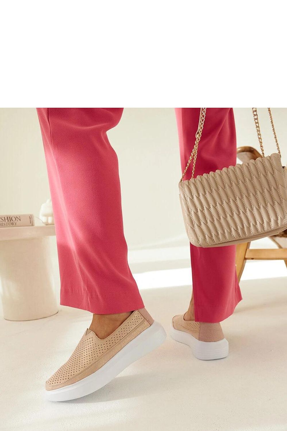 Solea Marta eco leather shoes displayed on a textured surface, emphasizing luxurious summer footwear design and comfort.