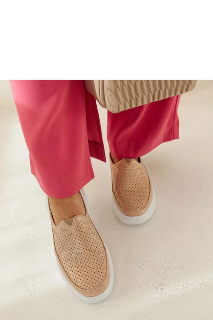 Back view of Solea black slip-on shoes featuring durable rubber sole, stylish and versatile for any summer occasion.