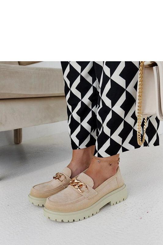 Solea Elenor Moccasins in beige suede, showcasing a sleek slip-on design with a chain accent, ideal for comfort and fashion.