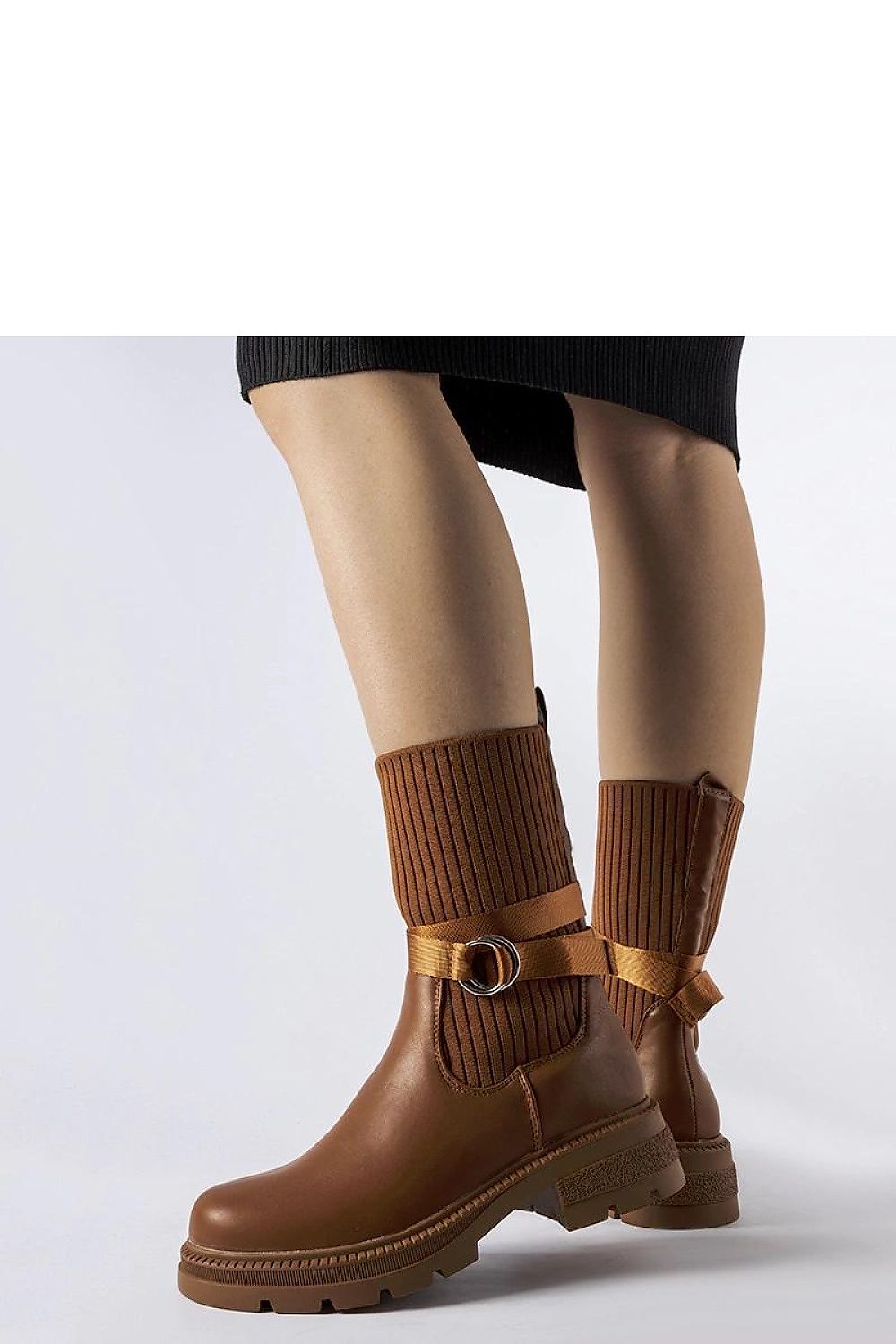 Solea luxurious brown fleece-lined heel boots displayed elegantly, showcasing high ankle design and round toe for a stylish look.