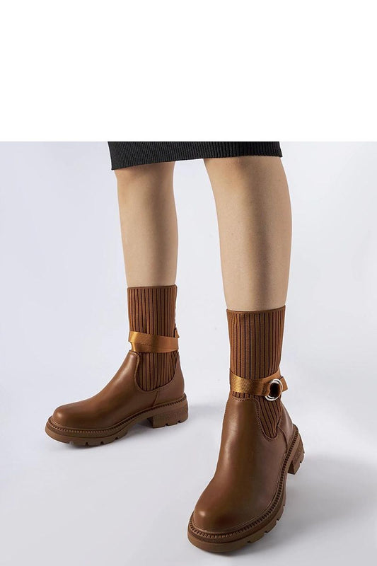 Interior view of Solea exquisite brown fleece-lined heel boots, highlighting the insulated comfort and soft lining for warmth.