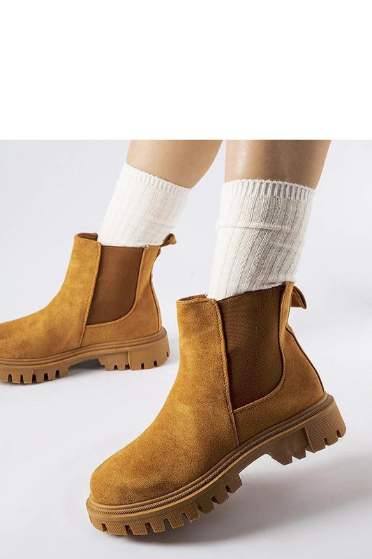 Elegant Solea caramel slip-on boots for women in eco leather, showcasing their stylish round toe and durable rubber sole, perfect for autumn and spring wear.