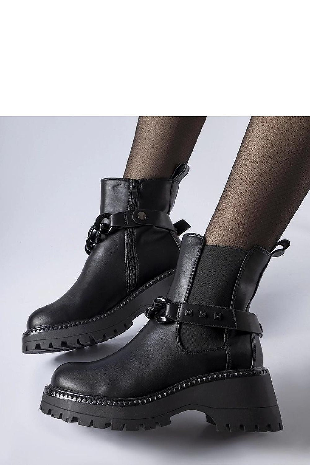 Elegant Solea black ankle boots featuring a trendy 6.5cm platform sole and convenient zipper closure, ideal for fashionable comfort in UK sizes EU 36-41.