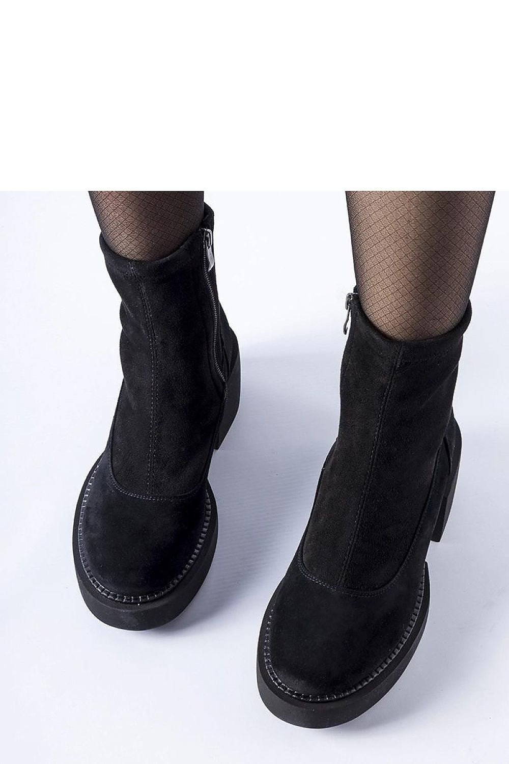 Solea Black Insulated Ankle Boots displayed in various angles, showcasing their fashionable eco leather material and modern block heel design.