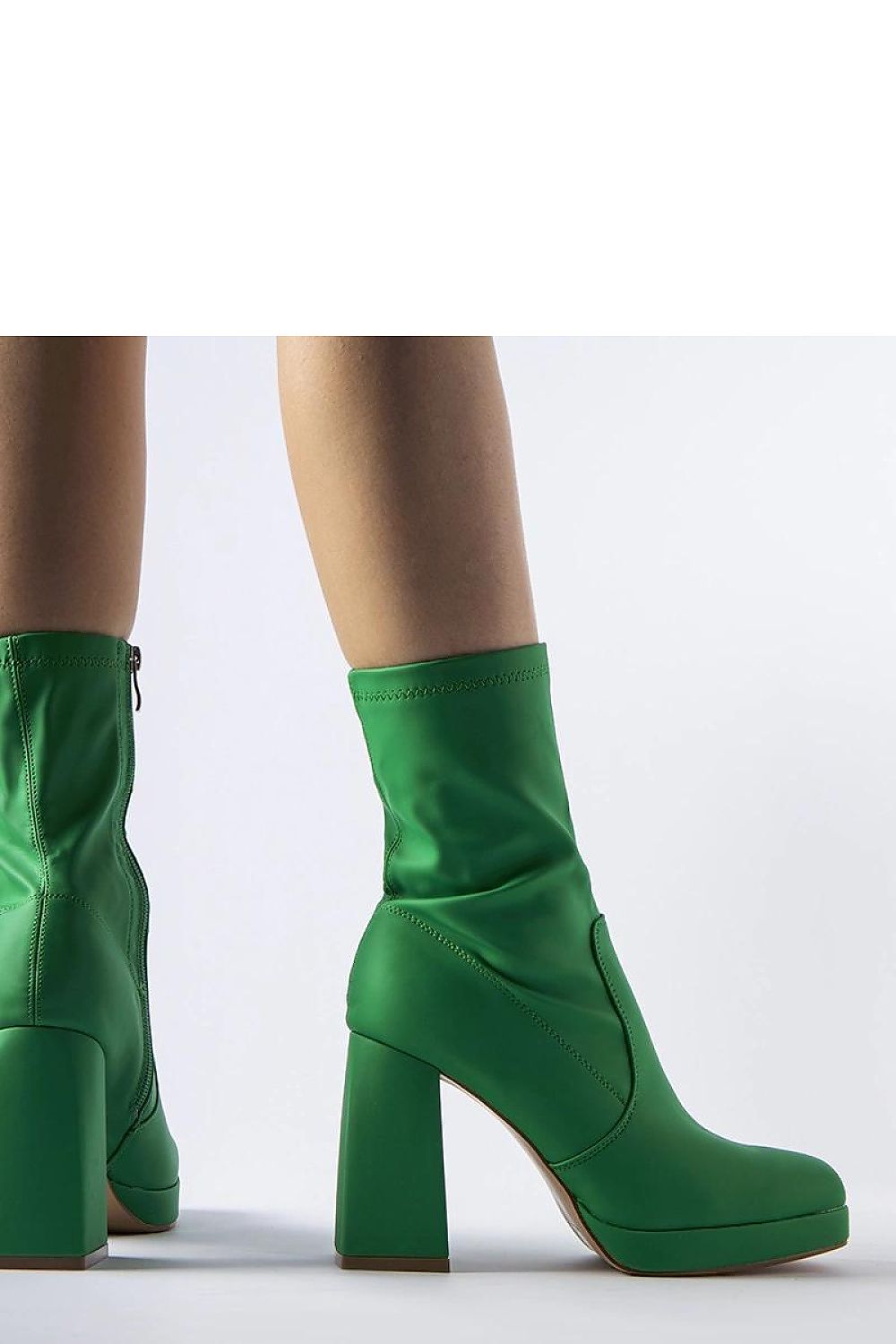 Chic and stylish high stiletto ankle boots in green matte by Solea, made with sustainable eco leather, ideal for autumn and spring outfits.