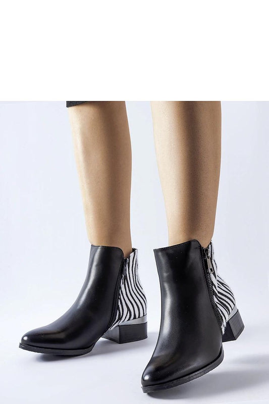 Luxury Solea black insulated ankle boots featuring a stylish zebra pattern, crafted from eco leather for comfort and elegance, available in sizes EU 36-41.