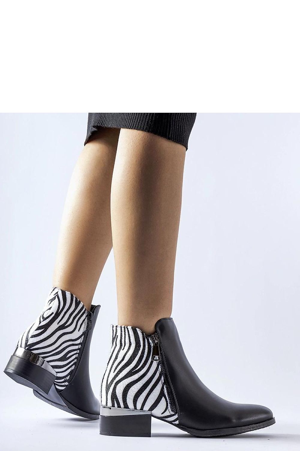 Close-up of Solea Black Insulated Zebra Pattern Ankle Boots, highlighting the premium eco leather material and modern zipper detail.