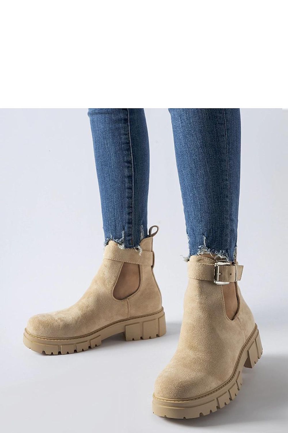 Solea beige eco-leather ankle boots featuring a decorative buckle and round toe design, perfect for luxurious everyday wear and special occasions.