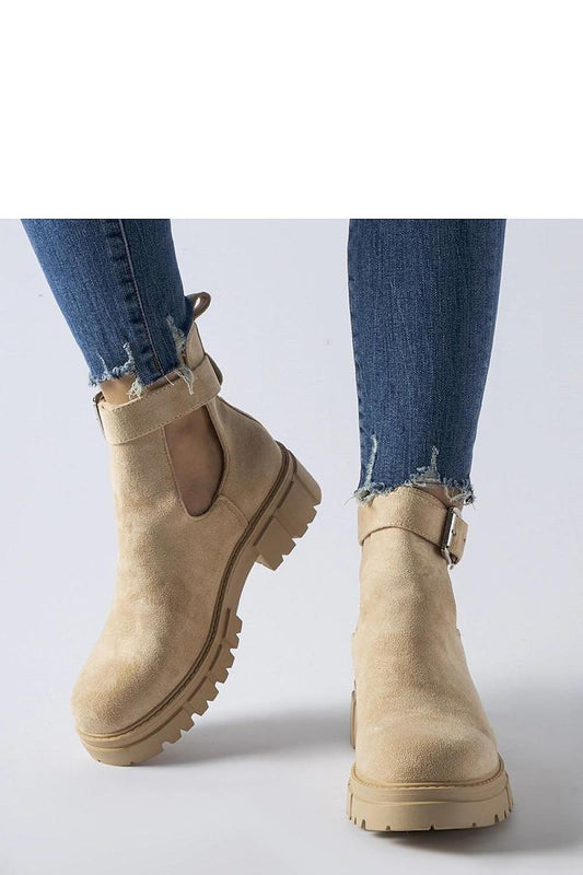 Elegant Solea beige ankle boots with a medium heel and slip-on construction, designed for comfort and style during Autumn/Spring.