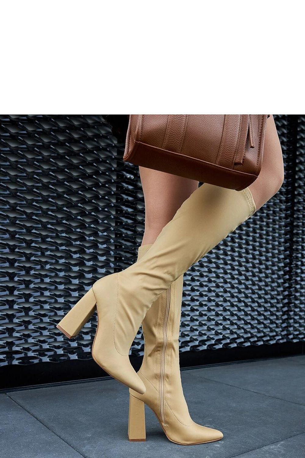 Elegant Solea beige thigh-high boots featuring a stylish Kemp design with an 11cm heel, showcasing luxury craftsmanship, perfect for fashion-forward women.