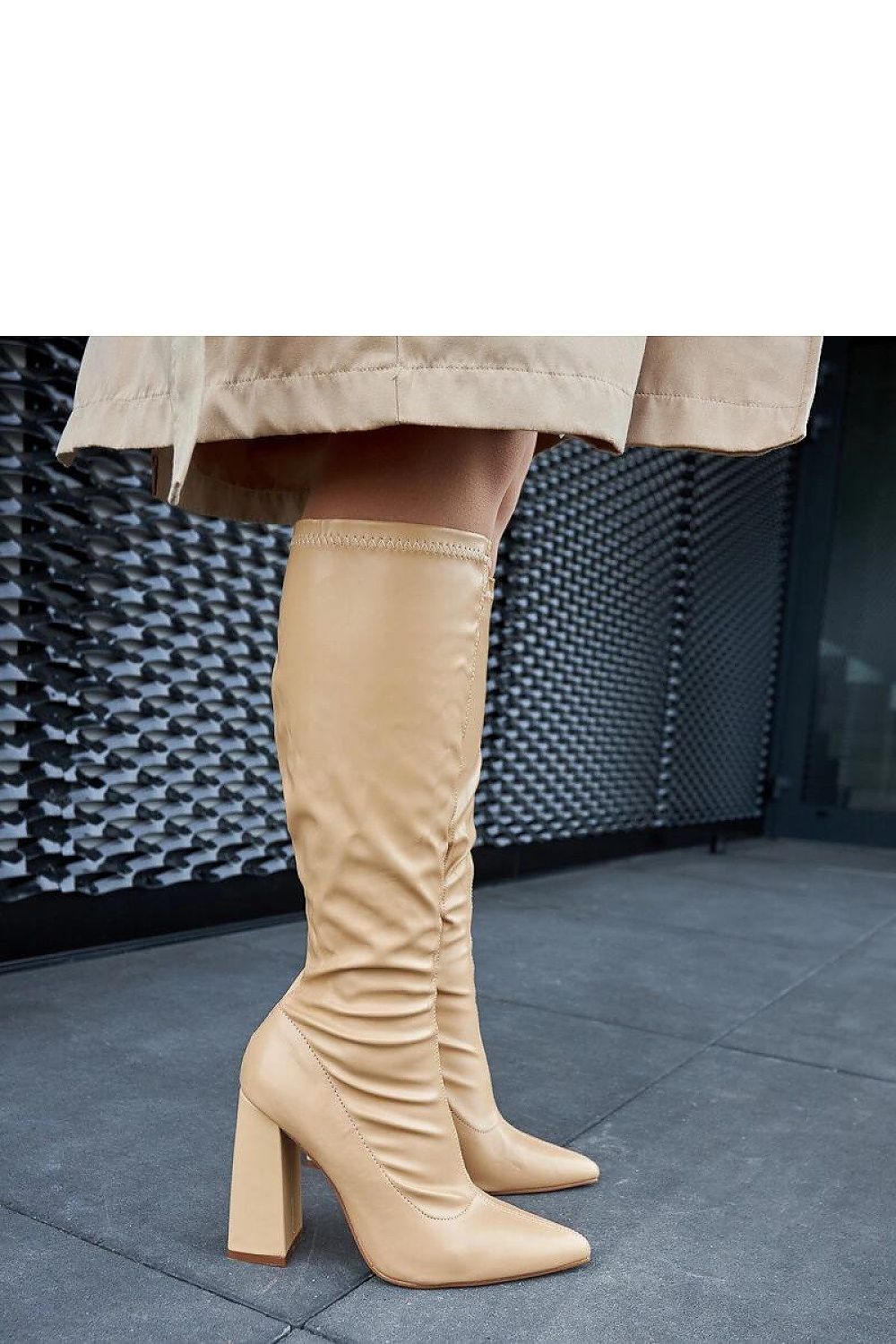 Solea Abelino beige thigh-high column boots displayed against a luxurious backdrop, emphasizing the modern and classic aesthetics.