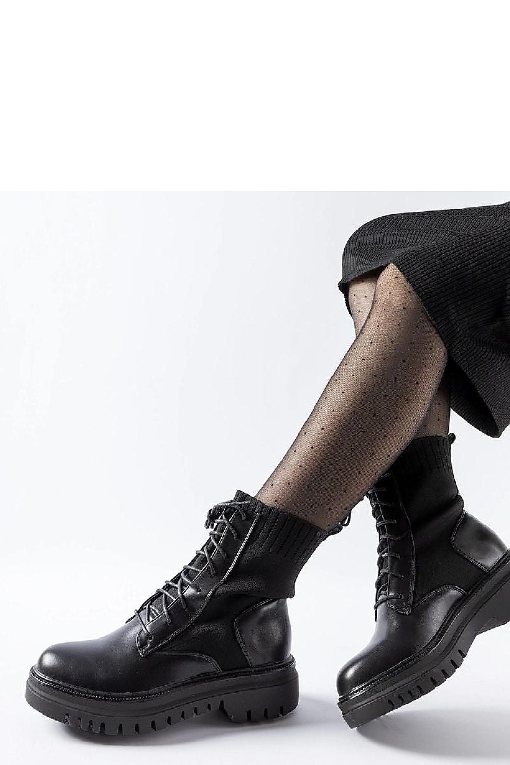 Elegant Solea Black Chunky Ankle Boots showcasing a sock-like design, perfect for stylish and comfortable footwear.