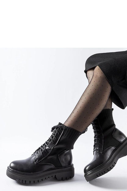 Elegant Solea Black Chunky Ankle Boots showcasing a sock-like design, perfect for stylish and comfortable footwear.