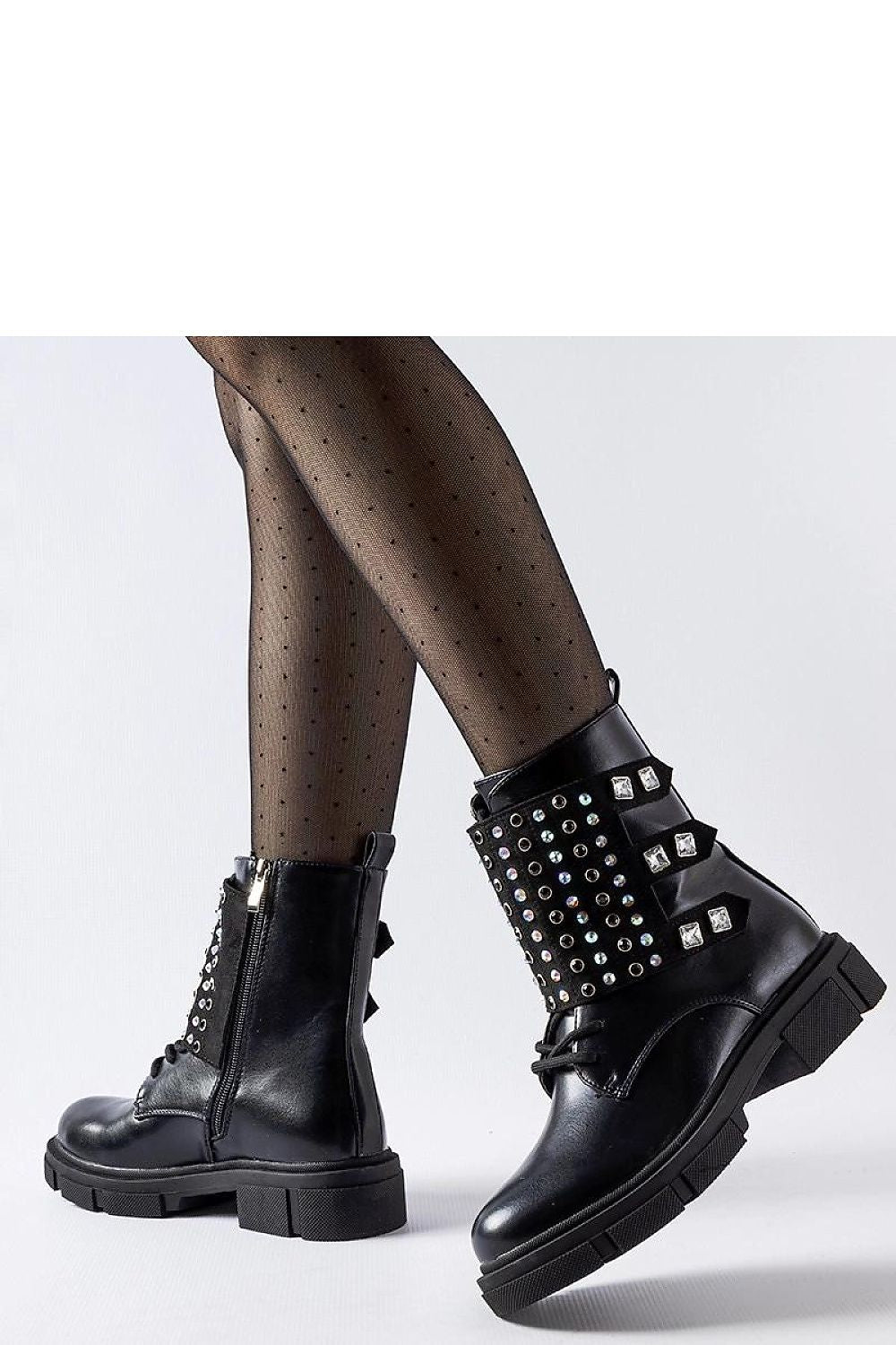 Stylish Solea eco leather ankle boots displayed, ideal for casual to formal outfits, highlighting the trendy ankle height and round toe design.