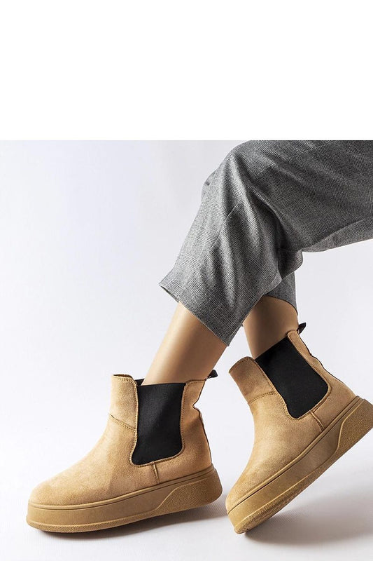 Close-up of Solea Women's Benilde Dark Beige Platform Boots with rubber sole, highlighting the chic and fashionable design ideal for modern women.