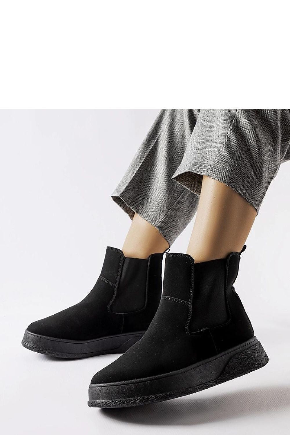 Solea Women's Benilde Platform Boots displayed against a stylish backdrop, exemplifying elegance and comfort in women's footwear.