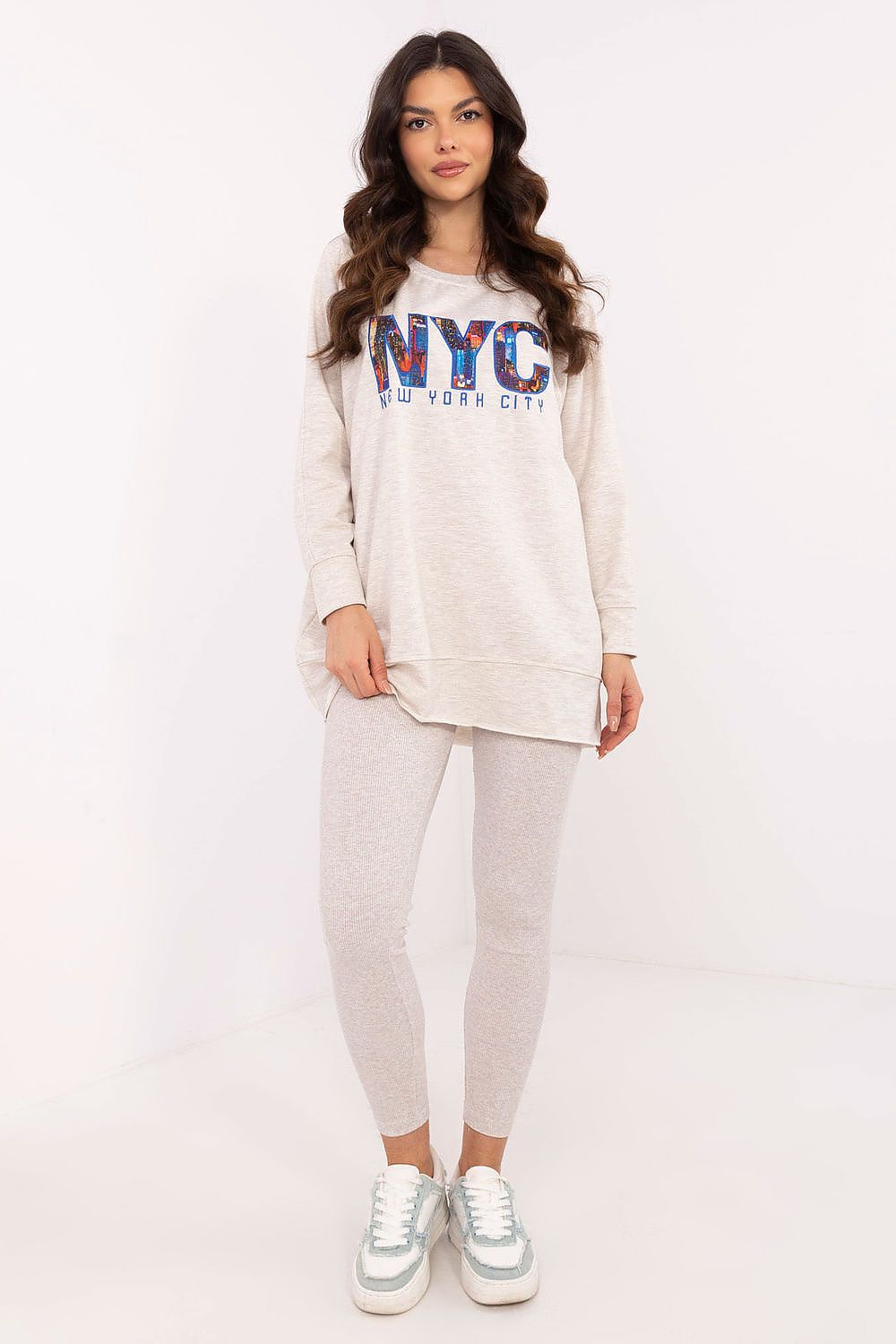 Luxury women's sweat set featuring a stylish sweatshirt and high waist leggings by Factory Price, crafted from premium cotton blend for comfort and elegance.