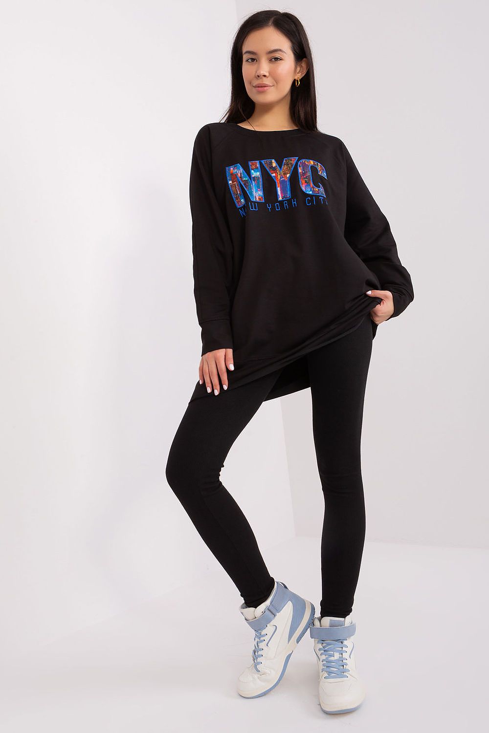 Elegant women's set by Factory Price, showcasing a chic sweatshirt and high waist leggings, perfect for relaxing at home or casual outings.
