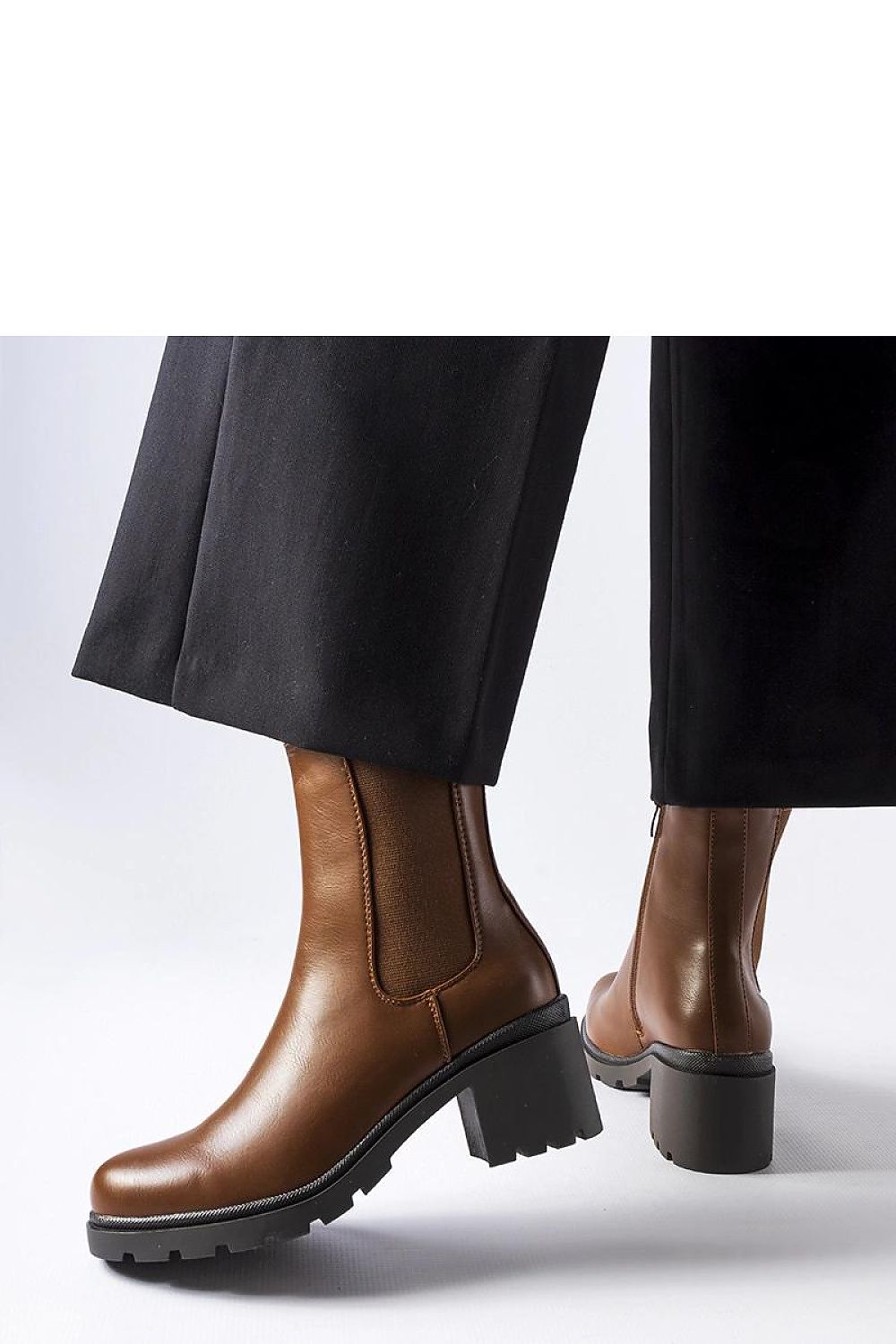 Solea Classic Brown Carseggio Boots in eco leather featuring a sleek stiletto heel, elegantly designed for comfort and style, perfect for any sophisticated wardrobe.