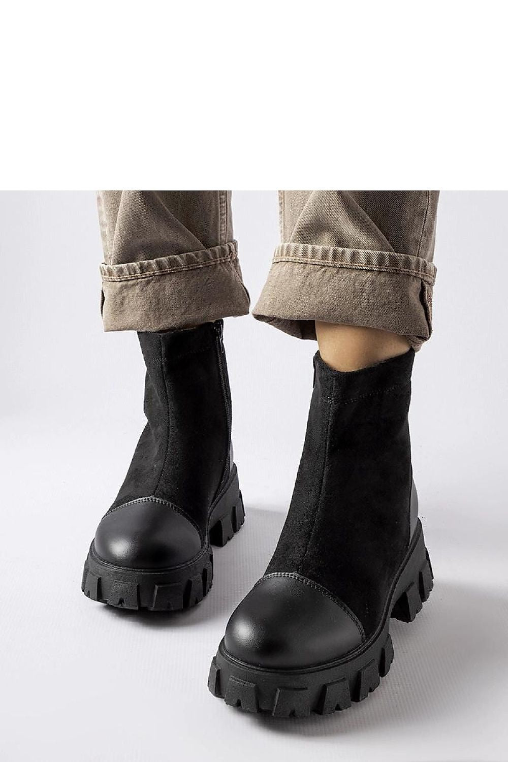 Stylish Solea Women's Black Eco-Suede Baggers displayed on a seasonal backdrop, ideal for trendy women seeking comfort and elegance.