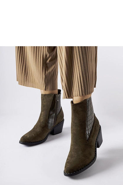 Close-up of Solea Women’s Eco-Suede Black Low-Post Heel Boots, highlighting the luxurious eco-leather material and sophisticated pointed toe.