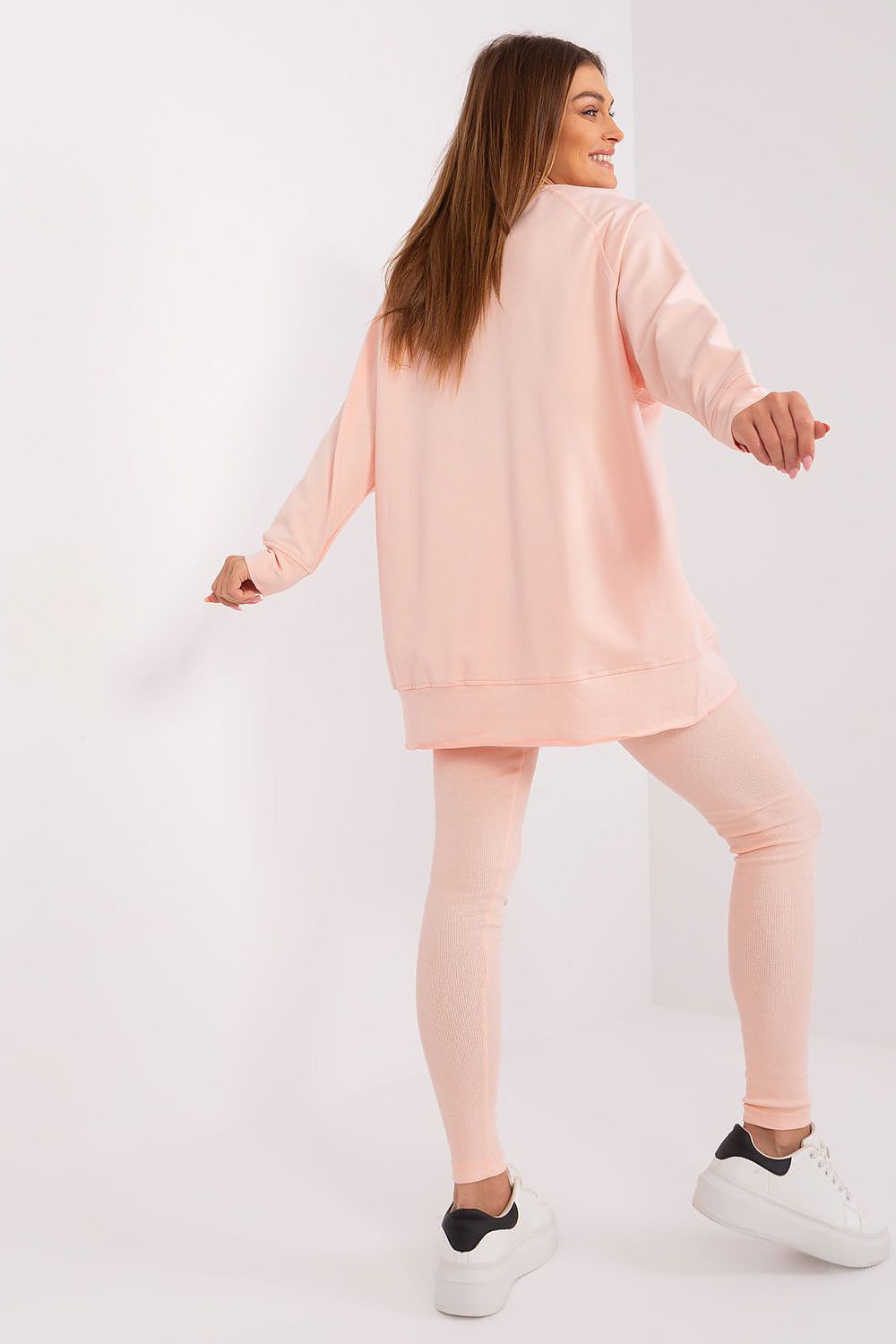 Close-up view of the Luxury Women's Set by Factory Price, highlighting the ribbed material and unique sweatshirt print for a fashionable appeal.